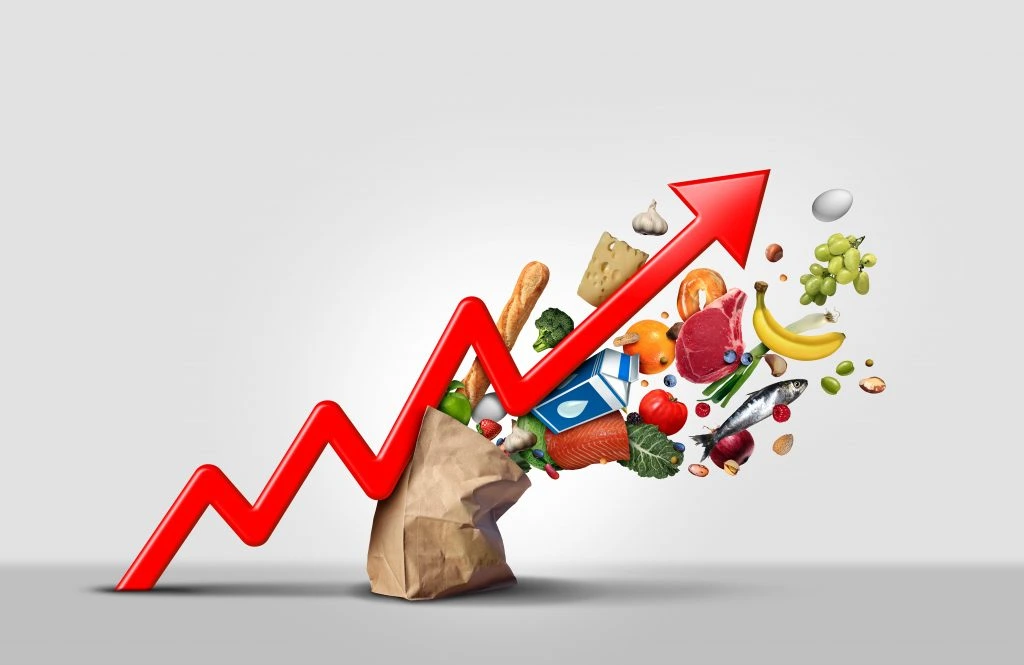 an upward trend line appears to be knocking over a bag of groceries